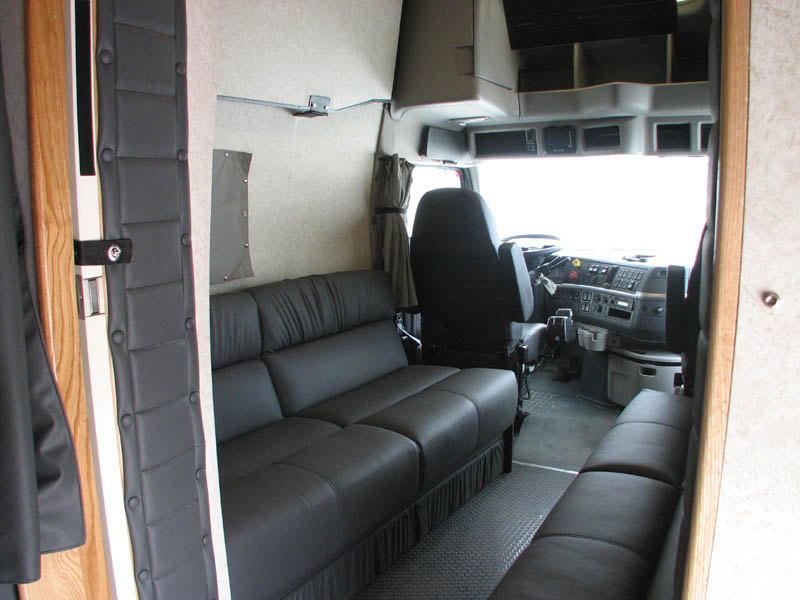 Cab coaches lounge area with fold down sofas